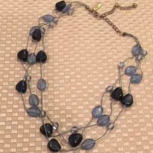 Blue beaded necklace held together with heavy blue string from New York and Co.